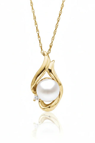 Elegant gold pearl pendant necklace with diamond accent, handcrafted for timeless elegance