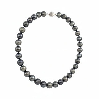 Necklace with dark gray pearls on a white background