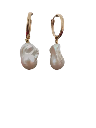 Pair of pearl earrings with gold hooks on a white background